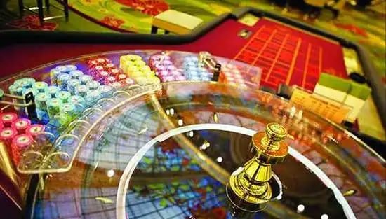 Playtech live roulette table with close-up camera on spinning wheel and betting layout